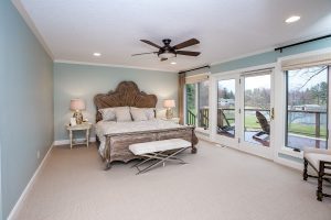 Master bedroom with recessed lighting and ceiling fan
